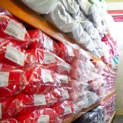 EU-REACH & Oeko-Tex compliant English Tulle & Dress Nets wrapped and stacked ready for order picking. Dress Net in warehouse