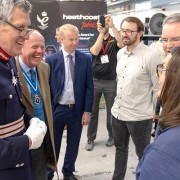 The Lord-Lieutenant of Devon chatting with a NASA engineer at Heathcoat's Queen's Award Presentation event